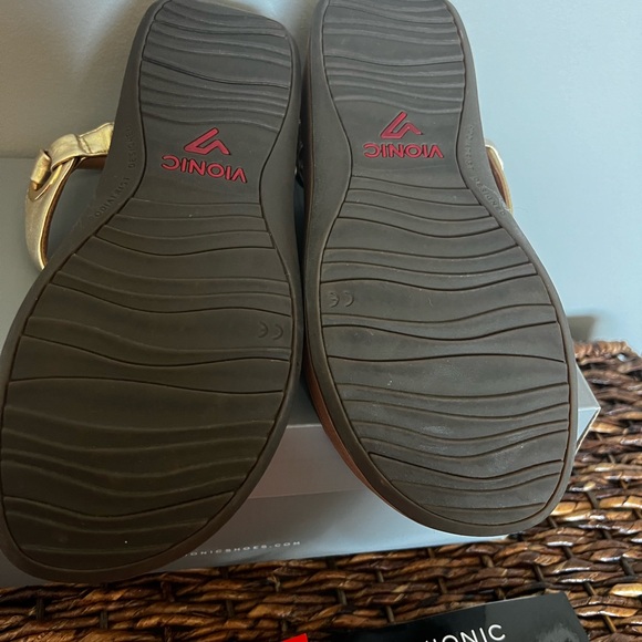 Size 7 (wide) Vionic Gold sandals. - Picture 10 of 11